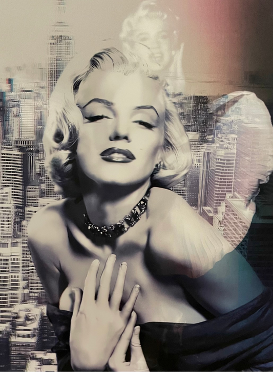 Black and white image of famous actress Marilyn Monroe with a cityscape background